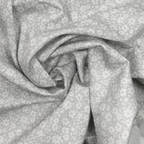 Piqué de coton imprimé fleurs printanière fond gris