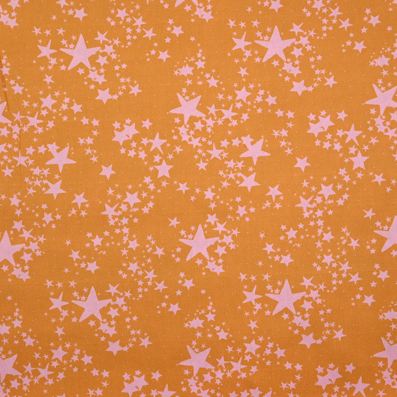 Coton imprimé élasthanne étoile rose pâle fond cannelle
