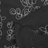 Cotton sail embroidered with enchanted flowers black background