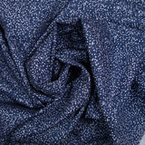 Satin de coton imprimé petites fleurs fond marine