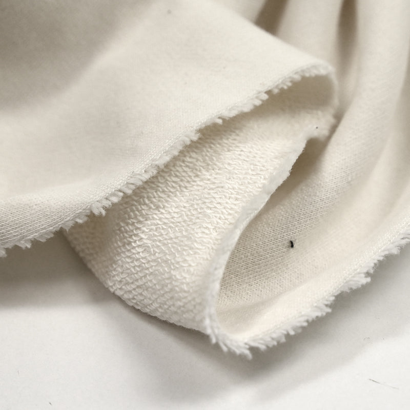 Molleton de coton élasthanne french terry crème