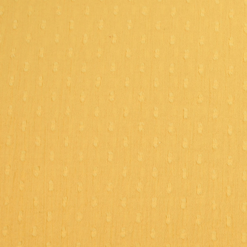 Vela de algodón plumetis ruge amarillo