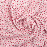 Crêpe viscose imprimé mini fleurs rouges sur fond blanc