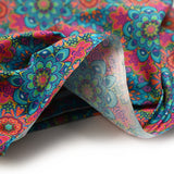 Coton imprimé mandala corail, bleu et rose