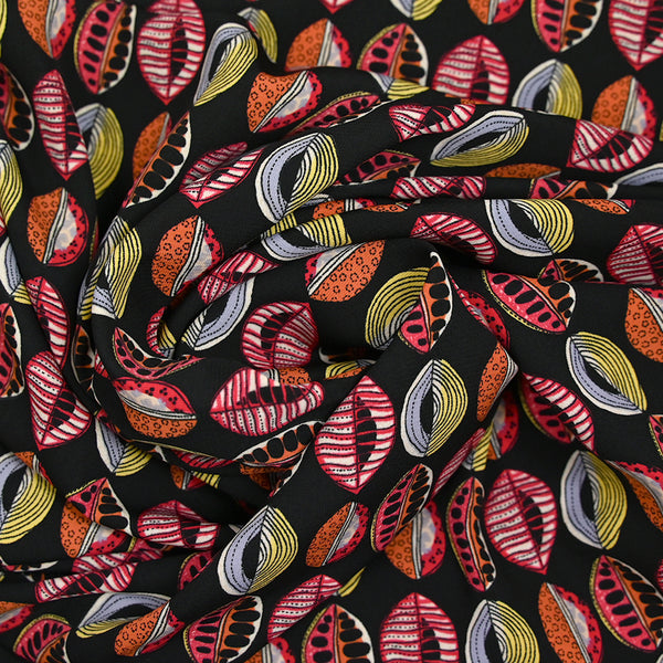 Polyester imprimé graines de bisous fond noir