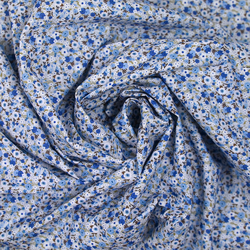 Coton imprimé s'épanouir bleu, blanc et vert