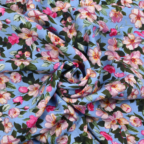 Crêpe polyviscose imprimé les fleurs du pont fond bleu