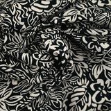 Coton imprimé croquis fleurs blanc fond noir