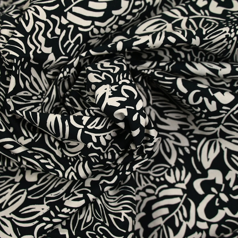 Coton imprimé croquis fleurs blanc fond noir