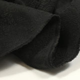 Jacquard de polyester tropique fond noir