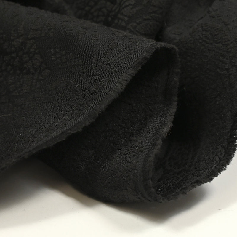 Jacquard de polyester tropique fond noir
