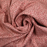 Toile de coton imprimée fleurs en miniature fond rose