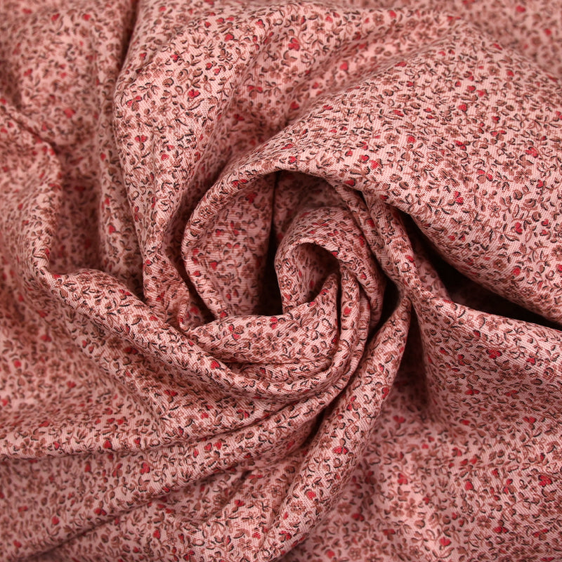 Toile de coton imprimée fleurs en miniature fond rose