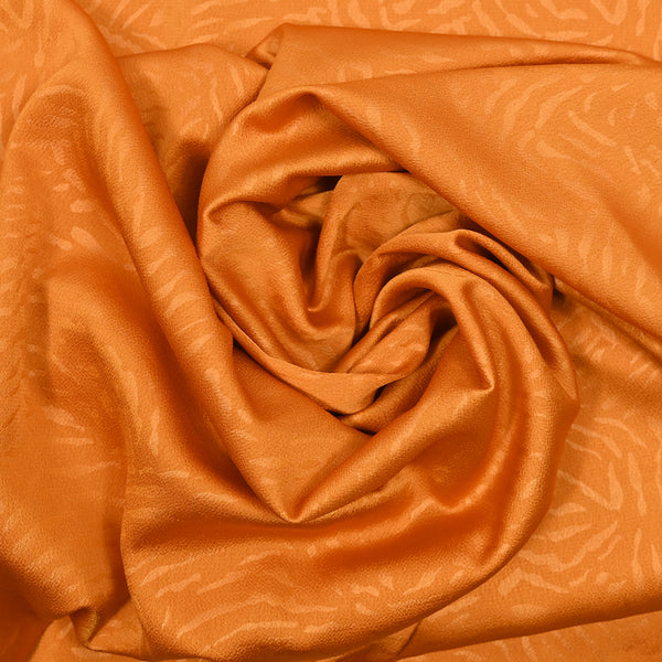 Crêpe satin de polyester magnolia fond orange