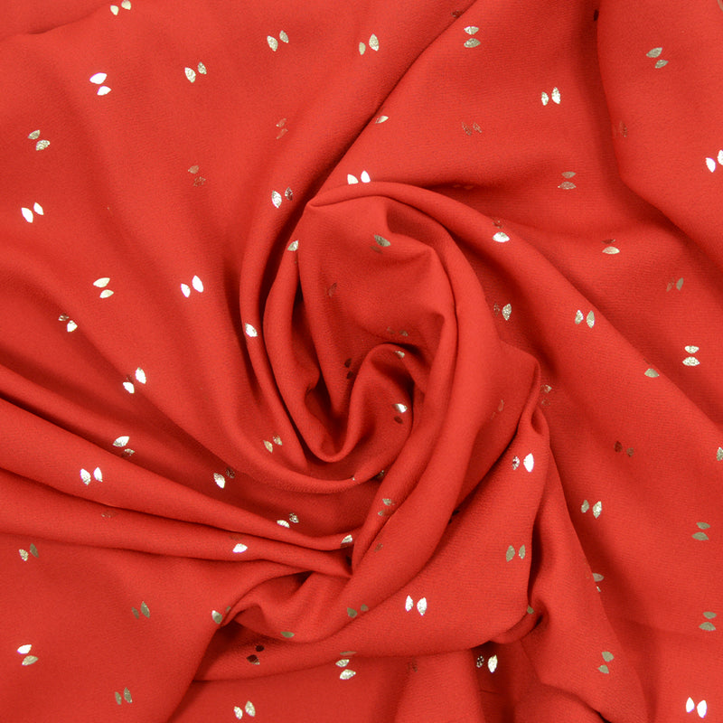 Crêpe georgette lurex sablier polyester fond rouge