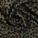 Satin polyester élasthanne imprimé tacheté kaki et noir