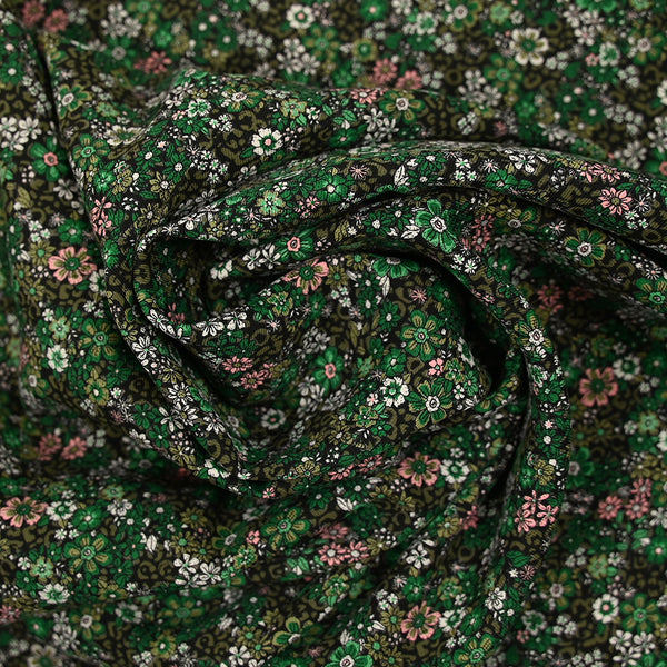 Twill de viscose imprimé rêverie vert et rose fond noir