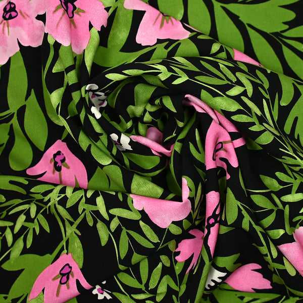 Viscose imprimée dans la nature vert et rose fond noir