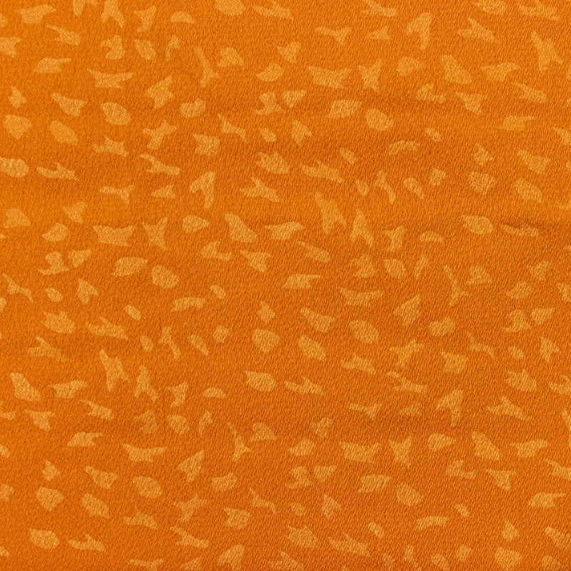 Crêpe satin de polyester Clarisse fond orange