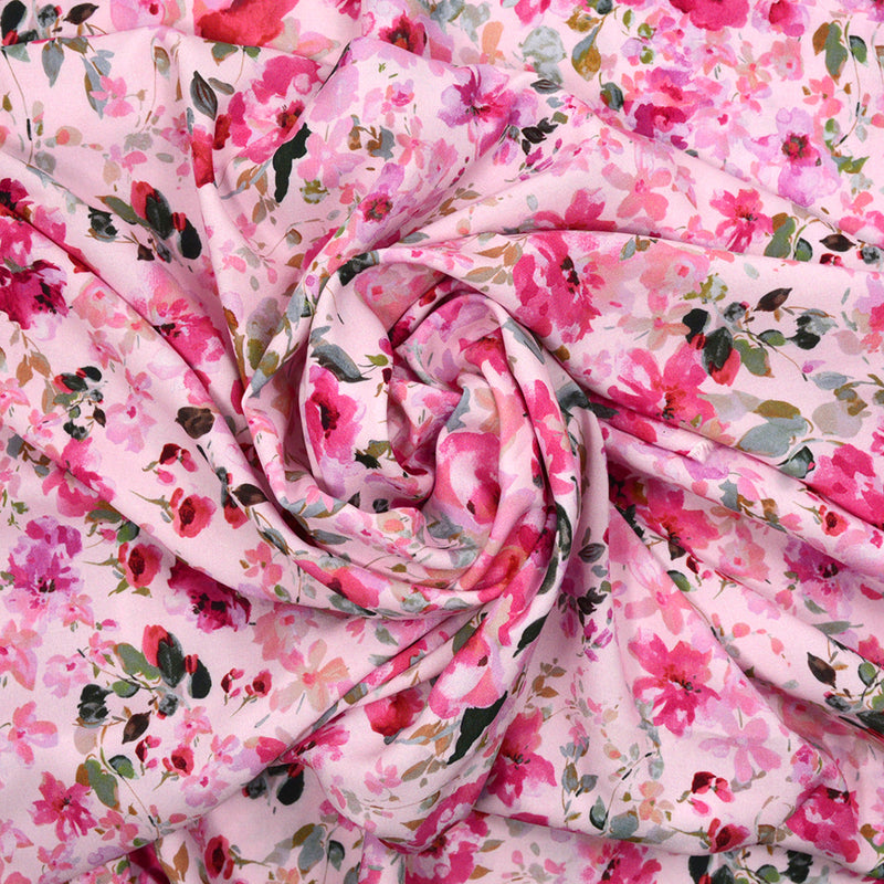 Viscose imprimée fleurs rose fond rose