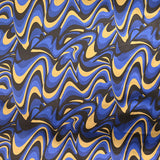 Satin de soie imprimé vagues fondues bleu et doré