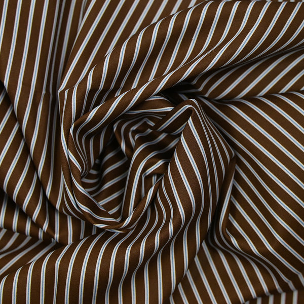 Coton imprimé rayé bleu fond marron