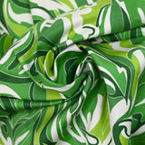 Cotton satin elastane printed foam green background