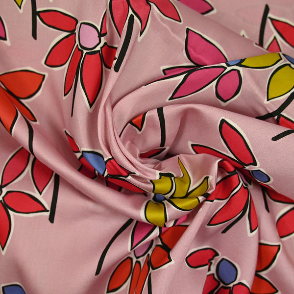 Coton satiné imprimé fleurs naïves orange fond rose
