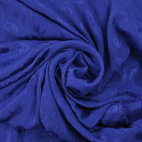 Mousseline polyester crinkle Elfy fond bleu roi