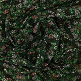 Jersey de coton imprimé rêverie vert et rose fond noir