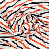 Marine striped cotton jersey and orange white background