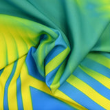 Sergé de polyester imprimé Guaruja vert et jaune fond bleu