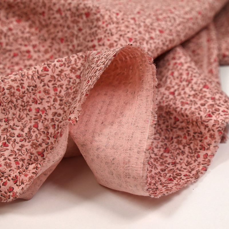 Toile de coton imprimée fleurs en miniature fond rose