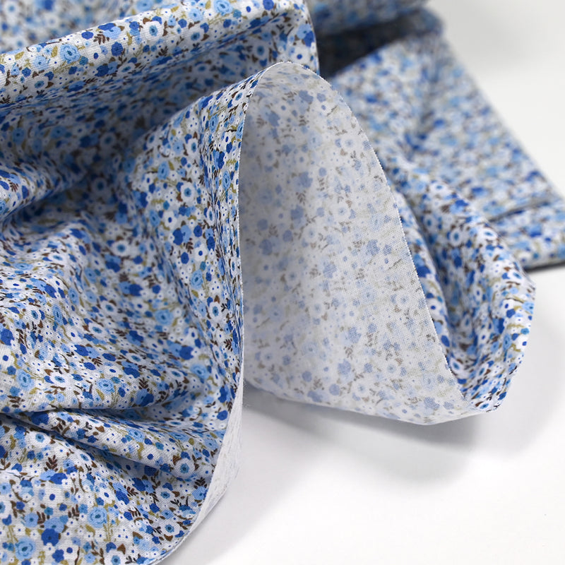 Coton imprimé s'épanouir bleu, blanc et vert