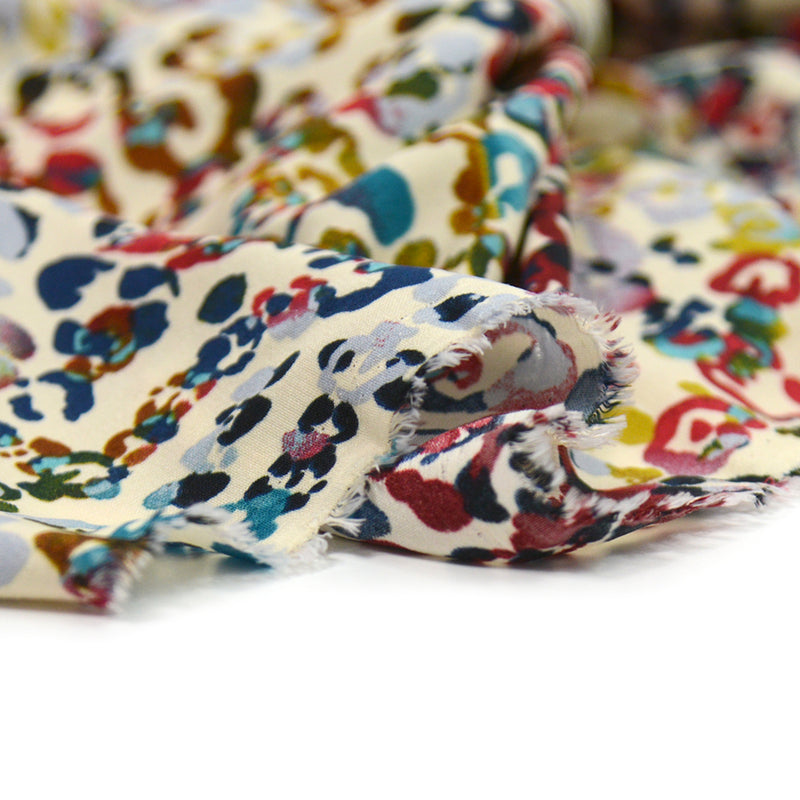 Polyester imprimé léopard multicolore fond beige