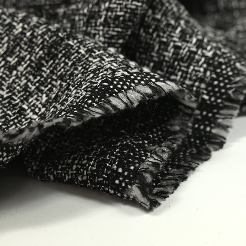 Tweed polyester noir et blanc effet chiné