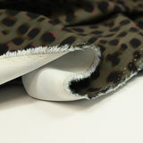 Satin polyester élasthanne imprimé tacheté kaki et noir
