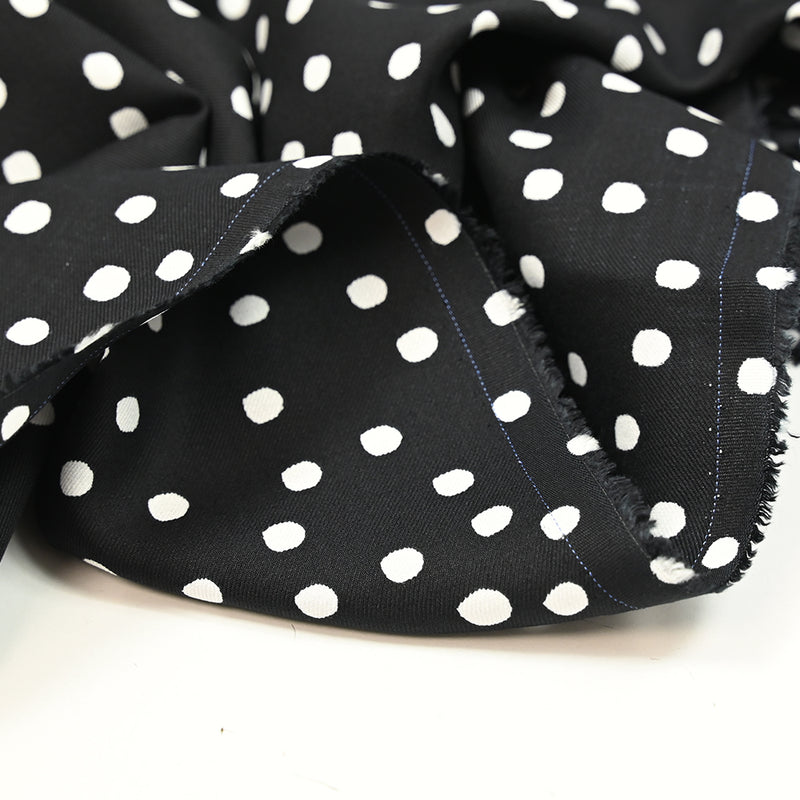 Twill de viscose imprimé à pois blanc fond noir