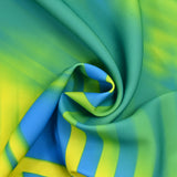 Sergé de polyester imprimé Guaruja vert et jaune fond bleu