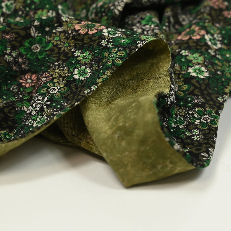 Jersey de coton imprimé rêverie vert et rose fond noir