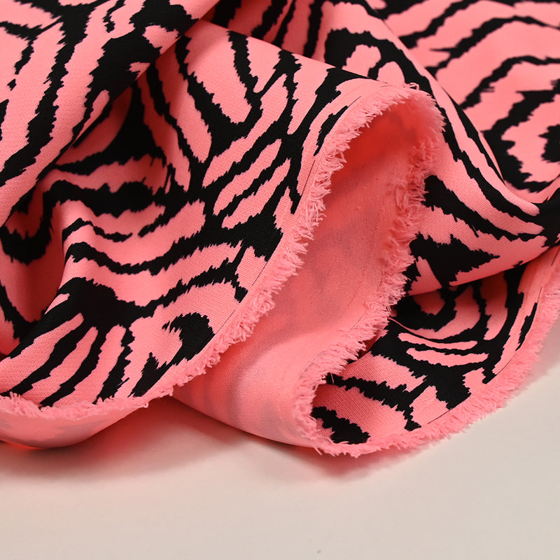 Impresión de crepe pesada en negro y rosa fluorescente