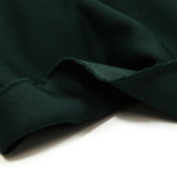Maille polo polyester vert bouteille