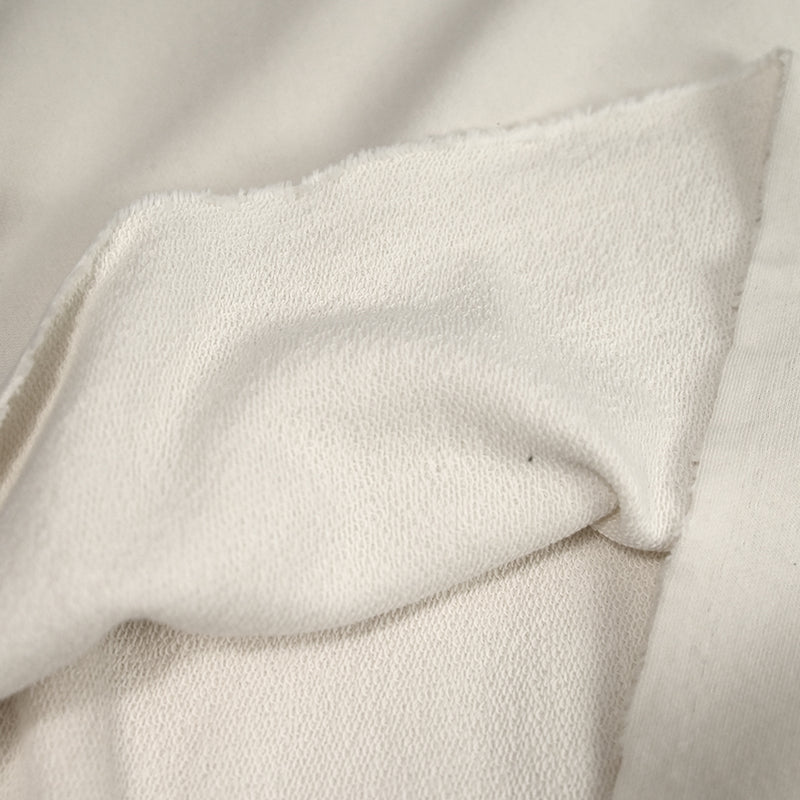 Molleton de coton élasthanne french terry crème