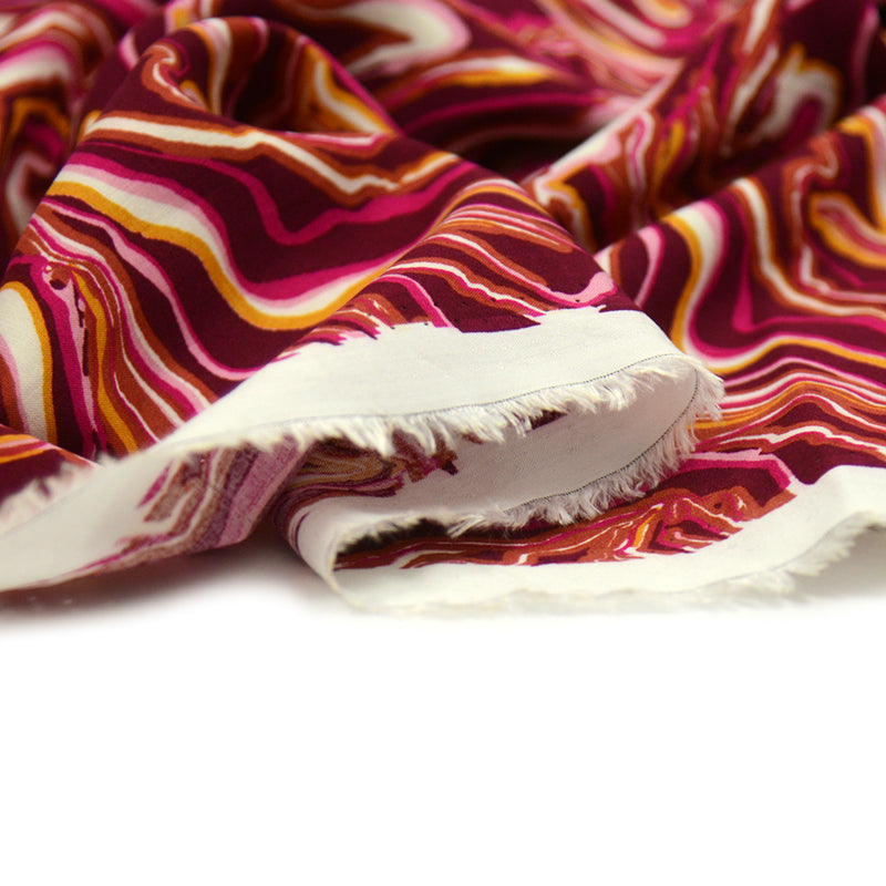 Viscose imprimée graphique abstrait fuchsia et jaune fond bordeaux