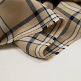Twill de viscose tissé teint carreaux marine fond beige