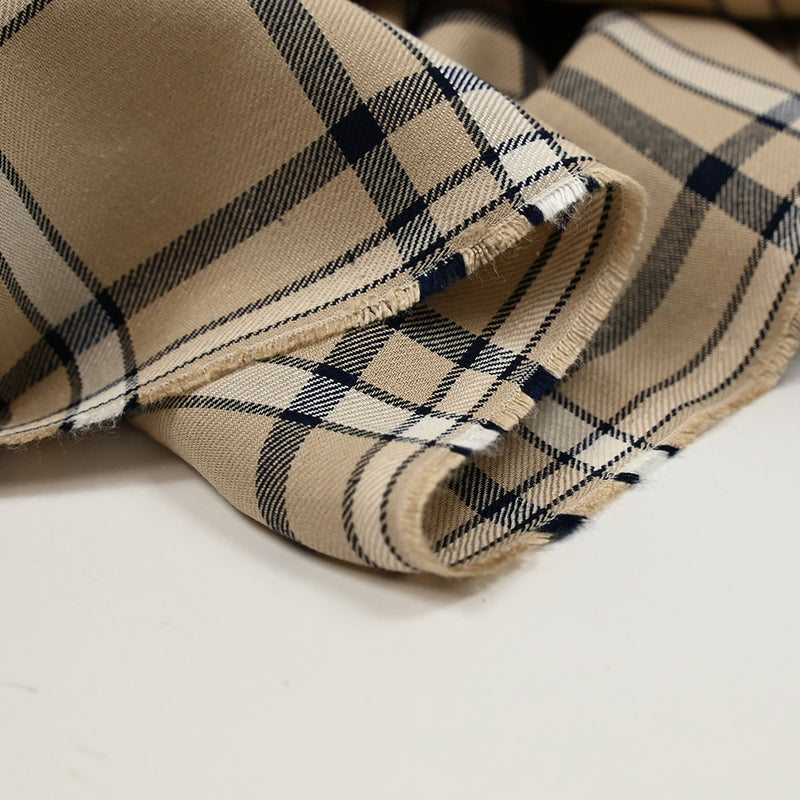 Twill de viscose tissé teint carreaux marine fond beige