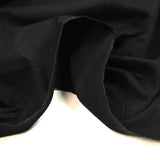 Jersey de coton fin ajouré feuilles fond noir