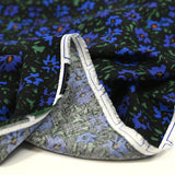 Twill de viscose imprimé champêtre bleu et vert sur fond noir