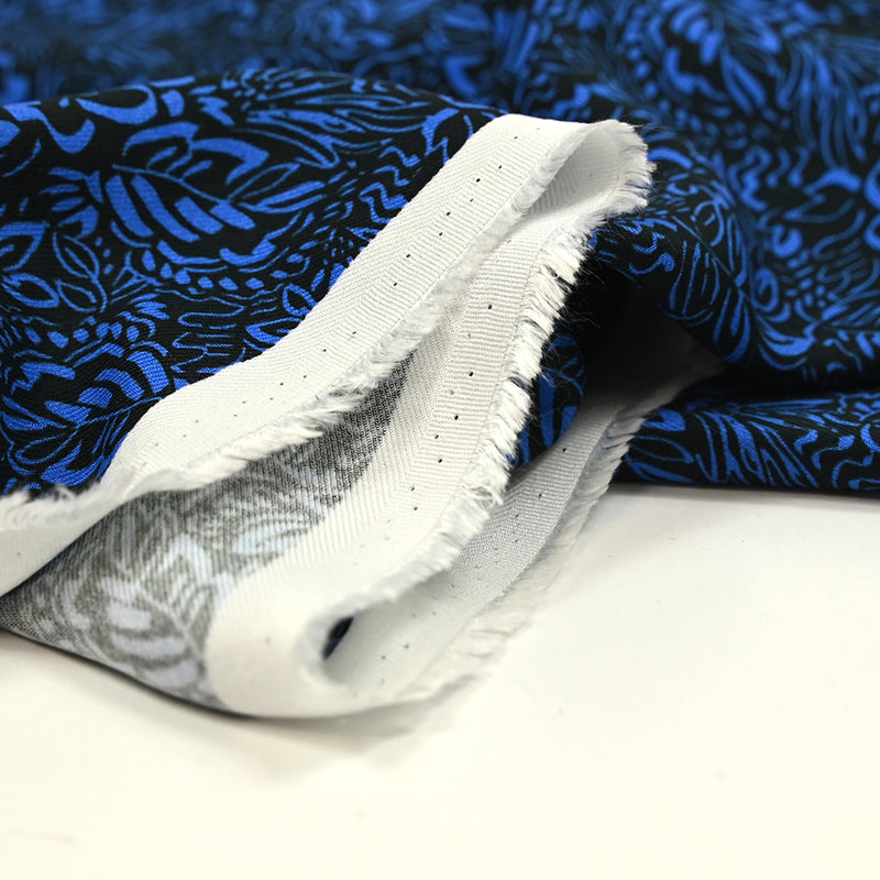 Twill de viscose imprimé feuillage bleu fond noir