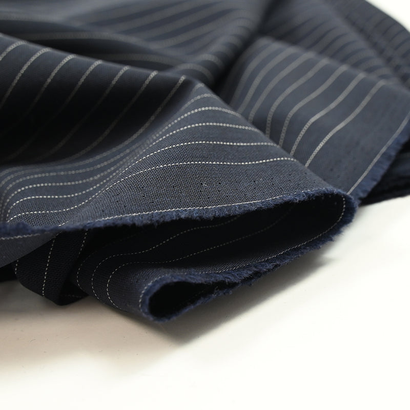 Tissu tailleur 100% laine rayé blanc fond marine